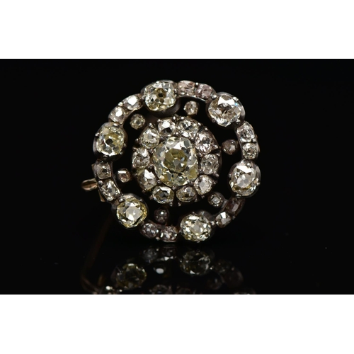 3 - A GEORGIAN DIAMOND CLUSTER BROOCH, set with a principal old European cut diamond, measuring approxim... 