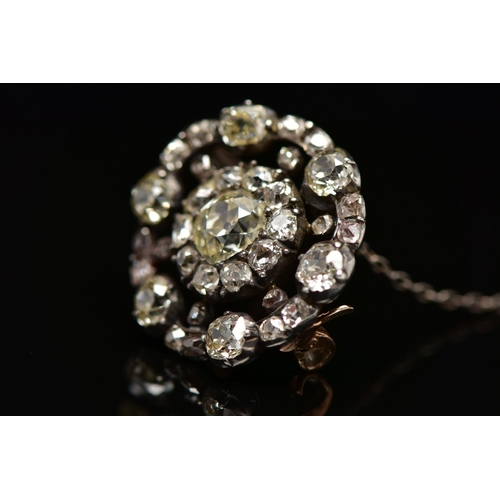3 - A GEORGIAN DIAMOND CLUSTER BROOCH, set with a principal old European cut diamond, measuring approxim... 