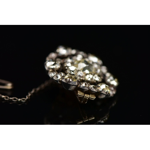 3 - A GEORGIAN DIAMOND CLUSTER BROOCH, set with a principal old European cut diamond, measuring approxim... 