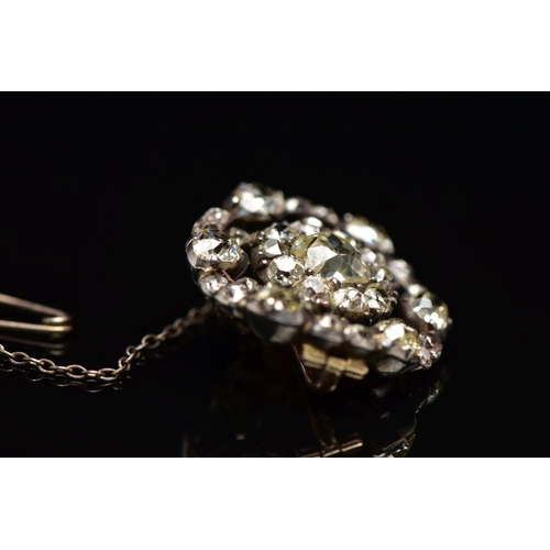 3 - A GEORGIAN DIAMOND CLUSTER BROOCH, set with a principal old European cut diamond, measuring approxim... 