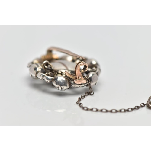 3 - A GEORGIAN DIAMOND CLUSTER BROOCH, set with a principal old European cut diamond, measuring approxim... 