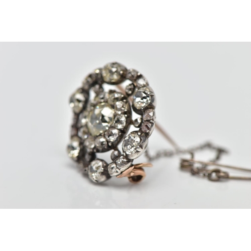 3 - A GEORGIAN DIAMOND CLUSTER BROOCH, set with a principal old European cut diamond, measuring approxim... 
