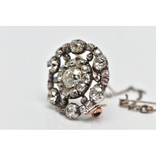 3 - A GEORGIAN DIAMOND CLUSTER BROOCH, set with a principal old European cut diamond, measuring approxim... 