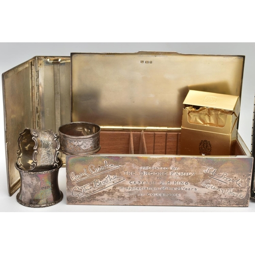 38 - A GEORGE VI SILVER RECTANGULAR CIGARETTE BOX AND SIX OTHER SILVER ITEMS, the cigarette box with engi... 