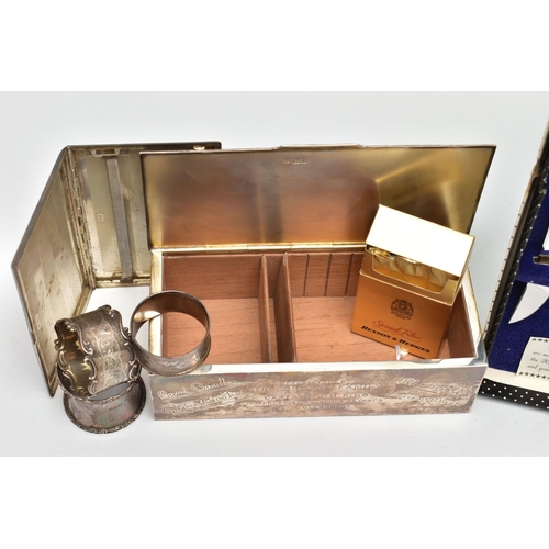 38 - A GEORGE VI SILVER RECTANGULAR CIGARETTE BOX AND SIX OTHER SILVER ITEMS, the cigarette box with engi... 