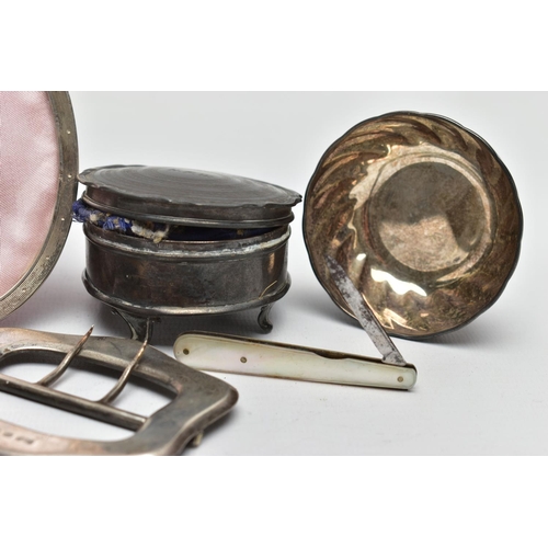 44 - A SMALL PARCEL OF SILVER, comprising a late Victorian buckle, plain with a wavy outline, maker's mar... 