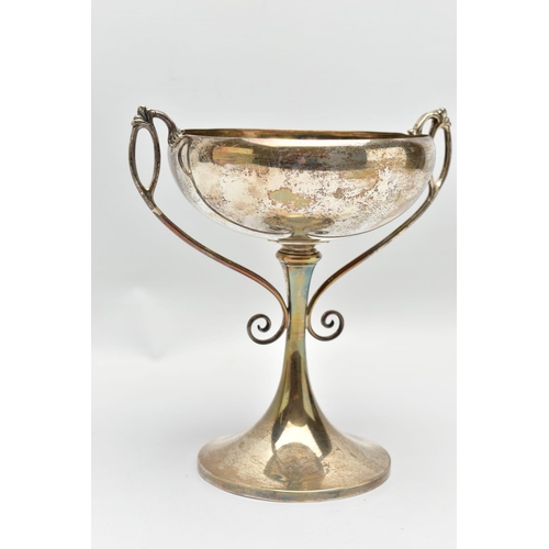 45 - A GEORGE V SILVER TWIN HANDLED TROPHY CUP, the shallow silver cup on a slender pedestal with cast sc... 