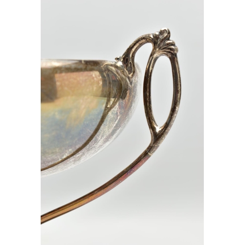 45 - A GEORGE V SILVER TWIN HANDLED TROPHY CUP, the shallow silver cup on a slender pedestal with cast sc... 