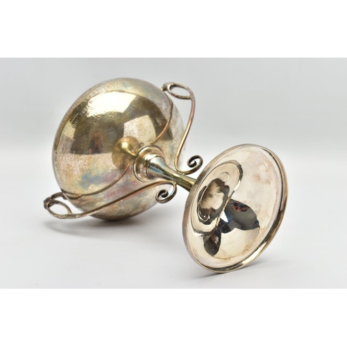 45 - A GEORGE V SILVER TWIN HANDLED TROPHY CUP, the shallow silver cup on a slender pedestal with cast sc... 