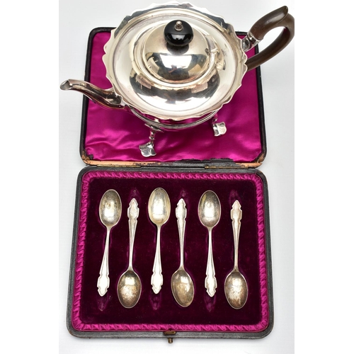 50 - AN EARLY 20TH CENTURY SILVER TEAPOT AND A SET OF SIX GEORGE V SILVER COFFEE SPOONS IN AN UNASSOCIATE... 
