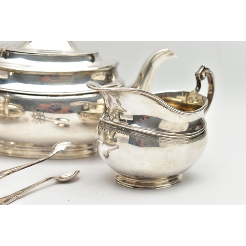 54 - A GEORGE V SILVER FOUR PIECE TEA SERVICE OF OVAL FORM, comprising tea pot, hot water/coffee jug, mil... 