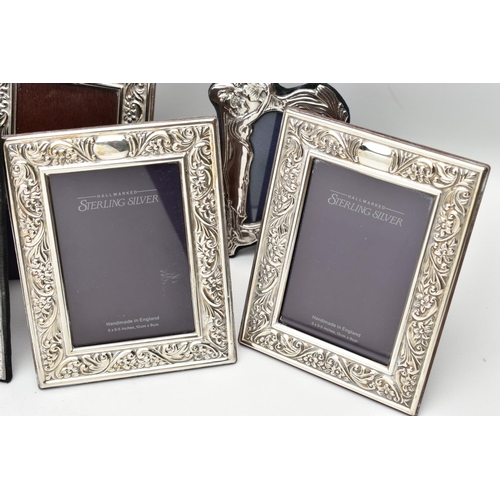 56 - SEVEN MODERN SILVER EASEL BACK PHOTOGRAPH FRAMES, comprising four matching frames of rectangular for... 