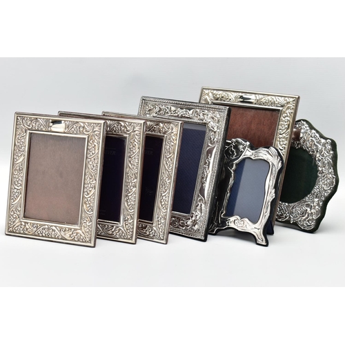 56 - SEVEN MODERN SILVER EASEL BACK PHOTOGRAPH FRAMES, comprising four matching frames of rectangular for... 