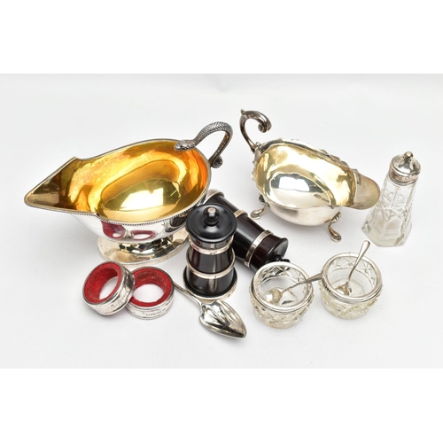 57 - A PAIR OF ELIZABETH II SILVER MOUNTED WOODEN SALT AND PEPPER GRINDERS, AN ELIZABETH II SILVER SAUCE ... 