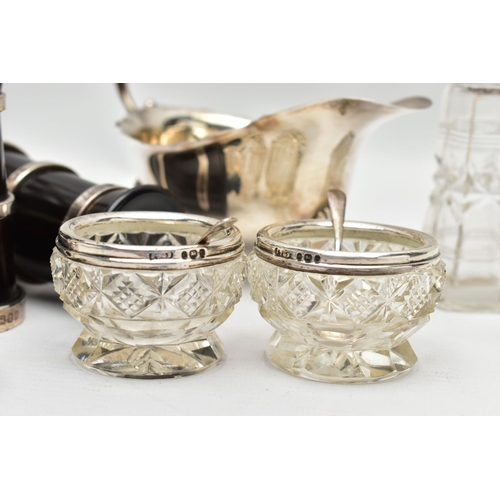 57 - A PAIR OF ELIZABETH II SILVER MOUNTED WOODEN SALT AND PEPPER GRINDERS, AN ELIZABETH II SILVER SAUCE ... 
