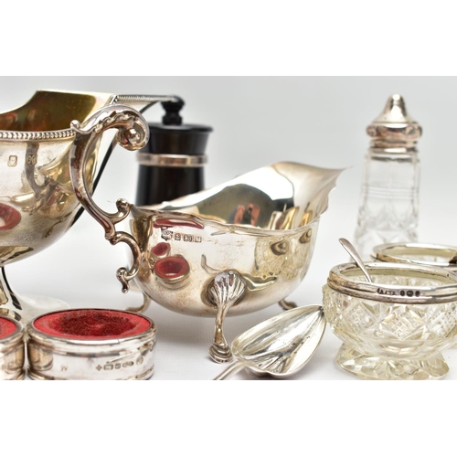 57 - A PAIR OF ELIZABETH II SILVER MOUNTED WOODEN SALT AND PEPPER GRINDERS, AN ELIZABETH II SILVER SAUCE ... 