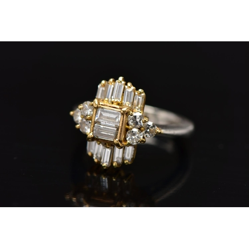 6 - A MODERN DIAMOND CLUSTER RING, set with two principal baguette cut diamonds, graduating baguette cut... 