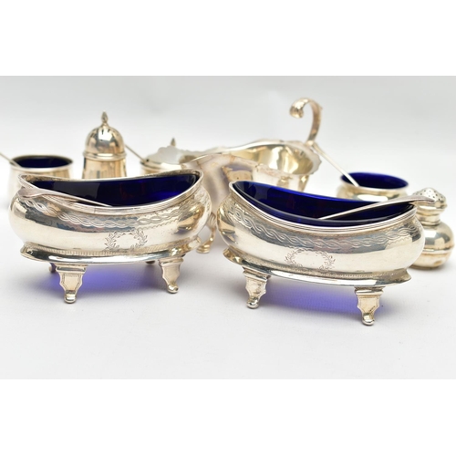 60 - A PAIR OF GEORGE V SILVER NAVETTE SHAPED SALTS, FOUR OTHER SILVER CRUET ITEMS, A GEORGE V SILVER SAU... 