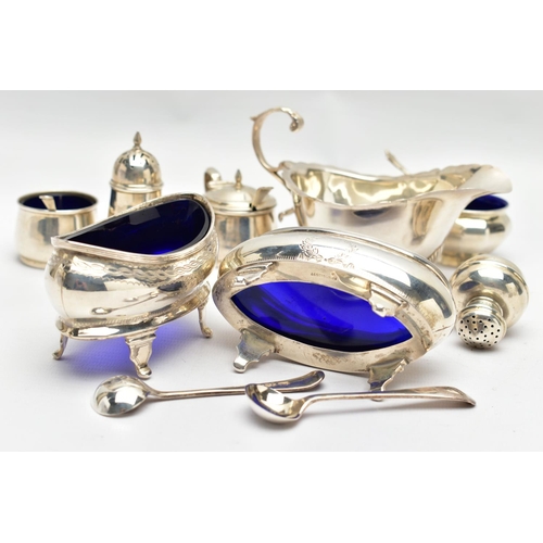 60 - A PAIR OF GEORGE V SILVER NAVETTE SHAPED SALTS, FOUR OTHER SILVER CRUET ITEMS, A GEORGE V SILVER SAU... 