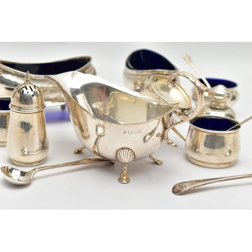 60 - A PAIR OF GEORGE V SILVER NAVETTE SHAPED SALTS, FOUR OTHER SILVER CRUET ITEMS, A GEORGE V SILVER SAU... 