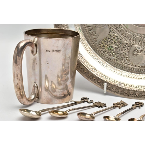 64 - A GEORGE VI SILVER MUG, AN INDIAN WHITE METAL TRAY AND SEVEN INDIAN WHITE METAL COFFEE SPOONS, the m... 