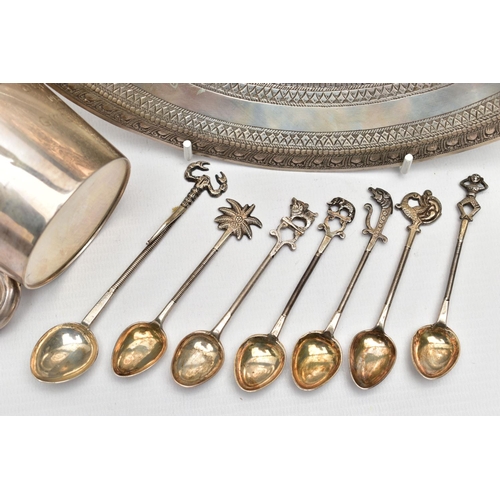 64 - A GEORGE VI SILVER MUG, AN INDIAN WHITE METAL TRAY AND SEVEN INDIAN WHITE METAL COFFEE SPOONS, the m... 