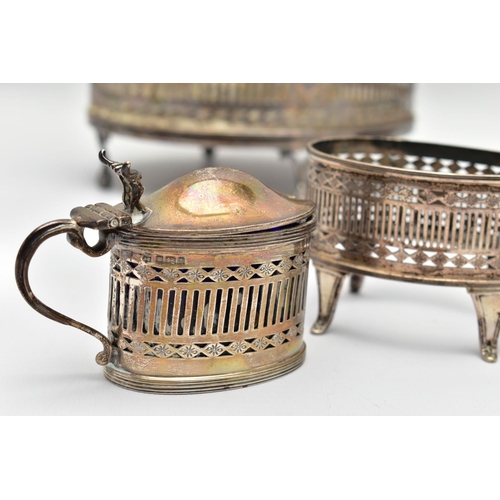 74 - A GEORGE III SILVER OVAL EIGHT BOTTLE CRUET FRAME, with chased and pierced gallery sides, engraved i... 