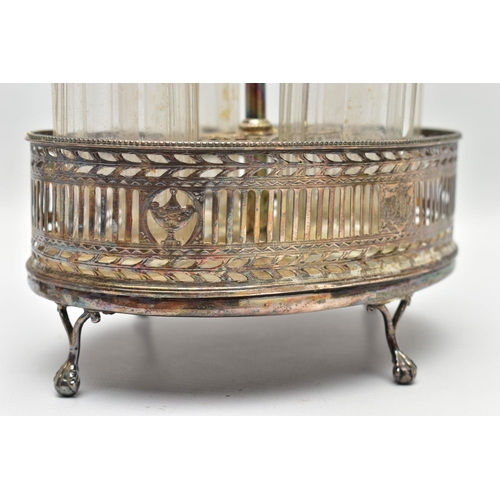 74 - A GEORGE III SILVER OVAL EIGHT BOTTLE CRUET FRAME, with chased and pierced gallery sides, engraved i... 