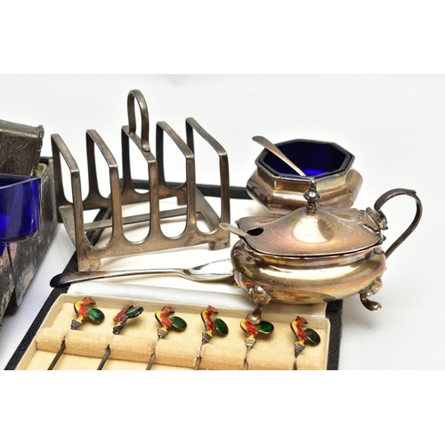 75 - A PARCEL OF SILVER CRUET ITEMS, NAPKIN RINGS, TOAST RACK, ETC, including a cased set of six cocktail... 