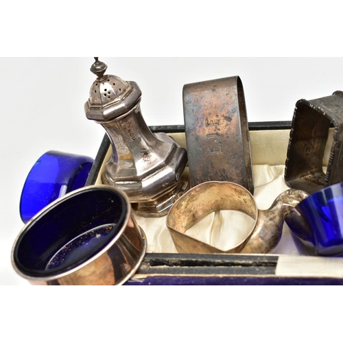 75 - A PARCEL OF SILVER CRUET ITEMS, NAPKIN RINGS, TOAST RACK, ETC, including a cased set of six cocktail... 
