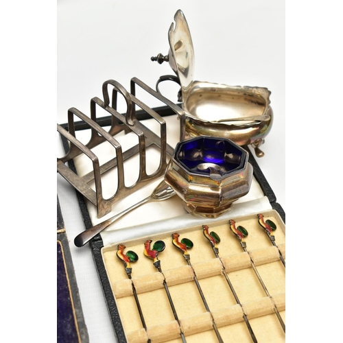 75 - A PARCEL OF SILVER CRUET ITEMS, NAPKIN RINGS, TOAST RACK, ETC, including a cased set of six cocktail... 