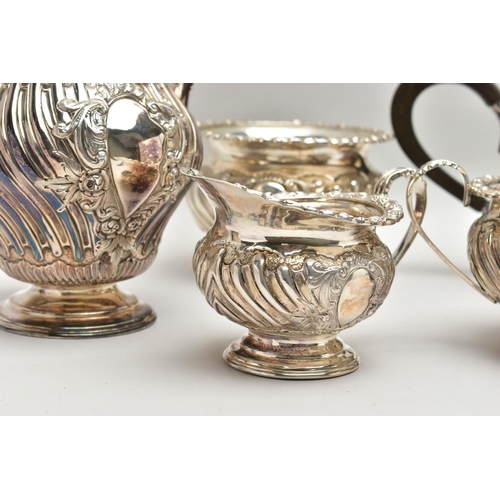 79 - A LATE VICTORIAN OAK CASED FIVE PIECE SILVER TEA SERVICE BY Z BARRACLOUGH & SONS OF LEEDS, the case ... 