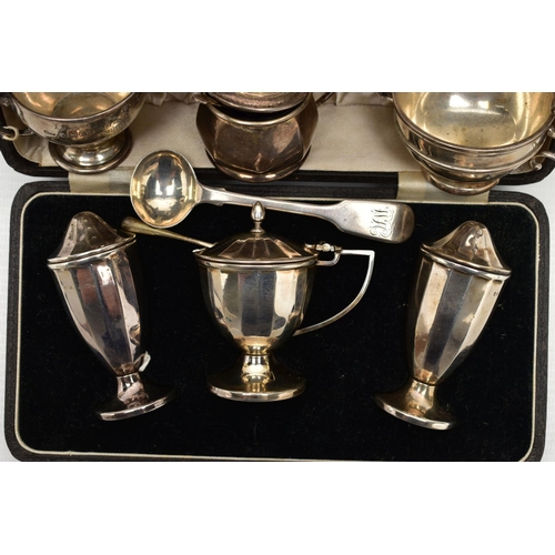 81 - A SMALL ASSORTMENT OF 19TH AND 20TH CENTURY SILVER, to include a cased condiment set, containing a s... 