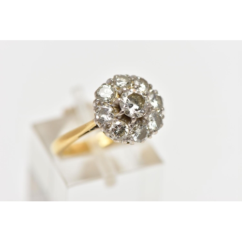 9 - A DIAMOND NINE STONE CLUSTER RING, set with a principal round brilliant cut diamond, surrounded by e... 