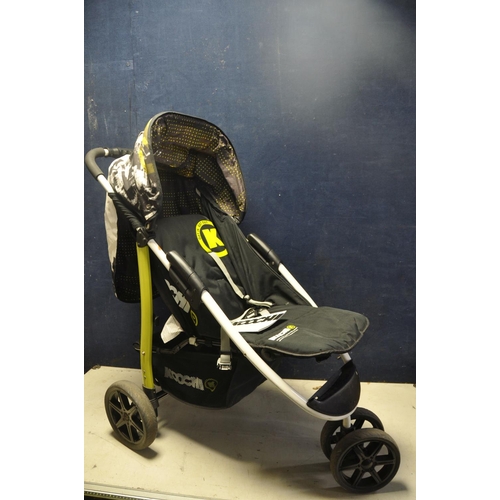 1051 - A KOOCHI PUSHMATIC PUSHCHAIR. three wheeled pushchair along with a Mothercare safari stroller, a Nan... 