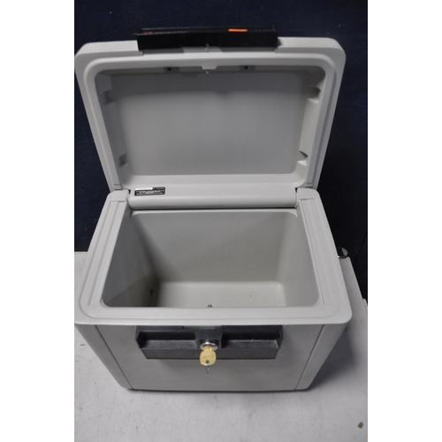 1058 - A SENTRY 1170 SAFE BOX, fireproof lockable safe box with key