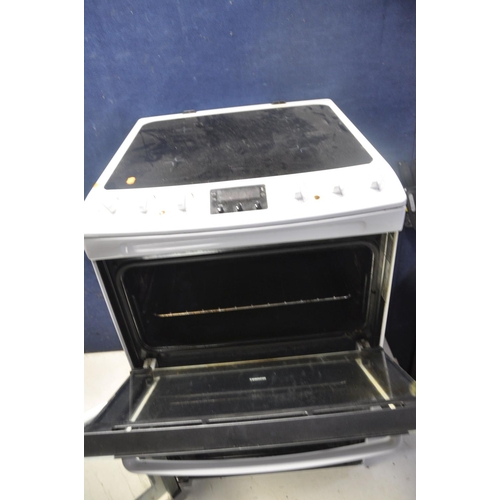 1059 - A ZANUSSI ZCV550MWC ELECTRIC COOKER measuring width 55cm x depth 65cm x height 90cm (UNTESTED)