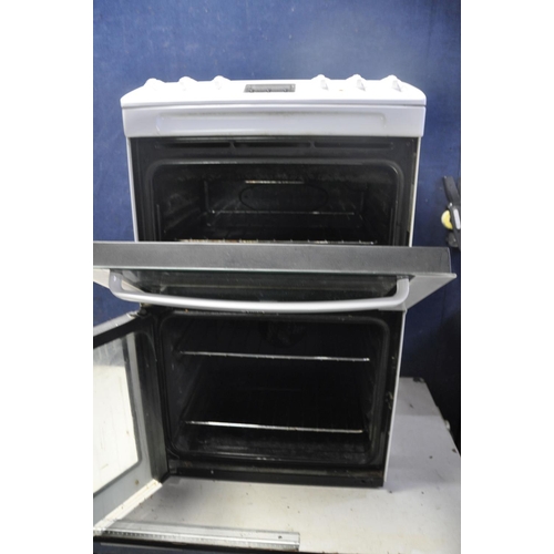 1059 - A ZANUSSI ZCV550MWC ELECTRIC COOKER measuring width 55cm x depth 65cm x height 90cm (UNTESTED)