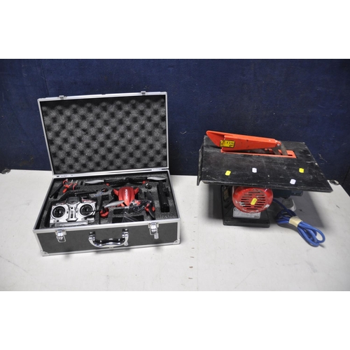 1101 - A POTENSIC MINI DRONE WITH CAMERA in case with spare parts and controller along with a Clarke woodwo... 