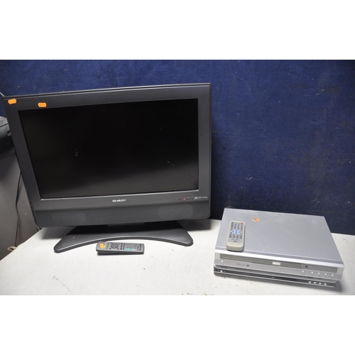 1114 - A SHARP LC-26SD1E 26in TV with remote AND TWO Alba DVD players model Numbers Dvd45 and DS-5711D (all... 