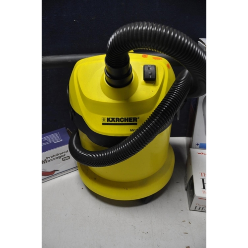 1116 - A KARCHER MV2 VACUUM no brush bar along with a JML circulation Maxx, Winterwarm therapeutic heat pad... 