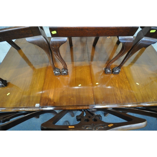 1219 - A VICTORIAN WALNUT WIND OUT DINING TABLE, with two leaves, on fluted legs, extended length 207cm x c... 