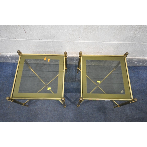 1220 - A PAIR OF MAISON JANSEN STYLE FRENCH BRASS SIDE TABLES, with smoked glass inserts, on Corinthian sup... 