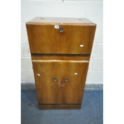 1225 - A MID CENTURY METAMORPHIC WALNUT COCKTAIL CABINET, with a mirrored interior, above two cupboard door... 