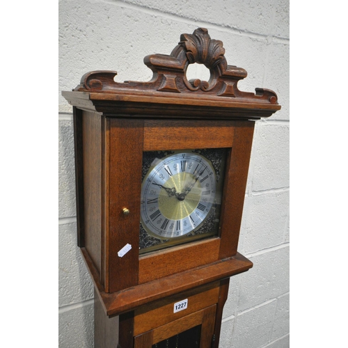 1227 - A MAHOGANY GRANDDAUGHTER CLOCK, with a brass and silvered dial, height 168cm, two weights and pendul... 