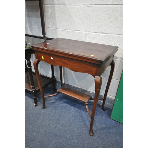 1229 - A EDWARDIAN MAHOGANY CARD TABLE, with a green baize playing, on cabriole legs, united by a cross str... 