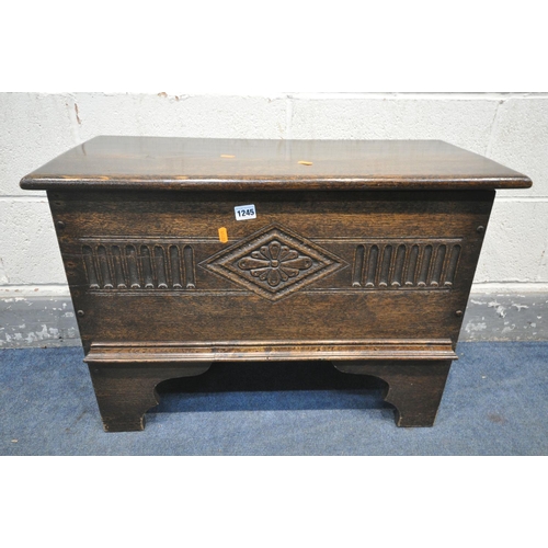 1245 - A REPRODUCTION OAK COFFER, width 75cm x depth 33cm x height 53cm (condition:-good condition)