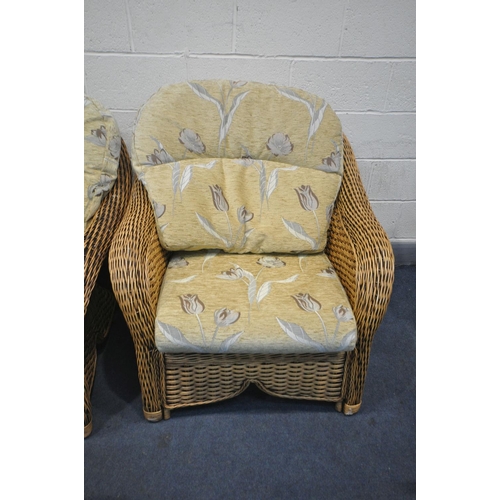 1262 - A PLATT AND HILL WICKER THREE PIECE LOUNGE SUITE, comprising a two seater sofa, a pair of  armchair,... 