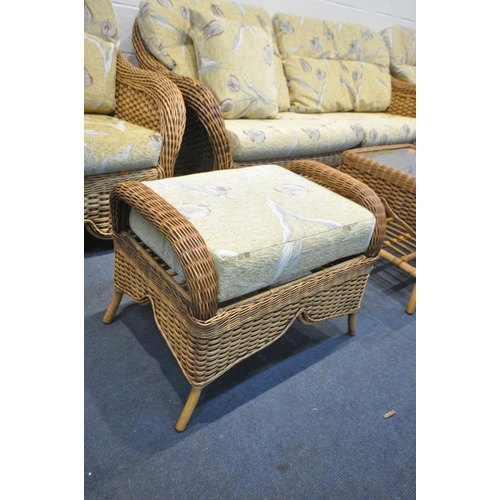 1262 - A PLATT AND HILL WICKER THREE PIECE LOUNGE SUITE, comprising a two seater sofa, a pair of  armchair,... 