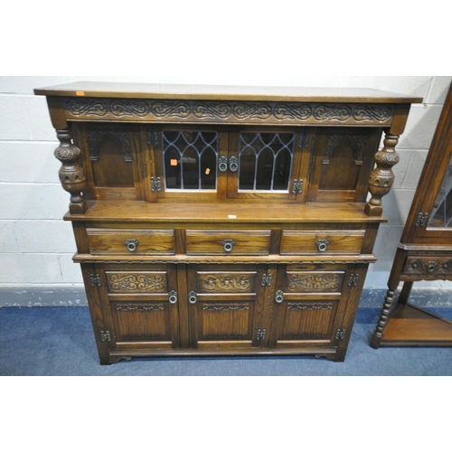 1263 - AN OLD CHARM OAK LEAD GLAZED CORNER CUPBOARD, with a single drawer on turned legs and undershelf, wi... 